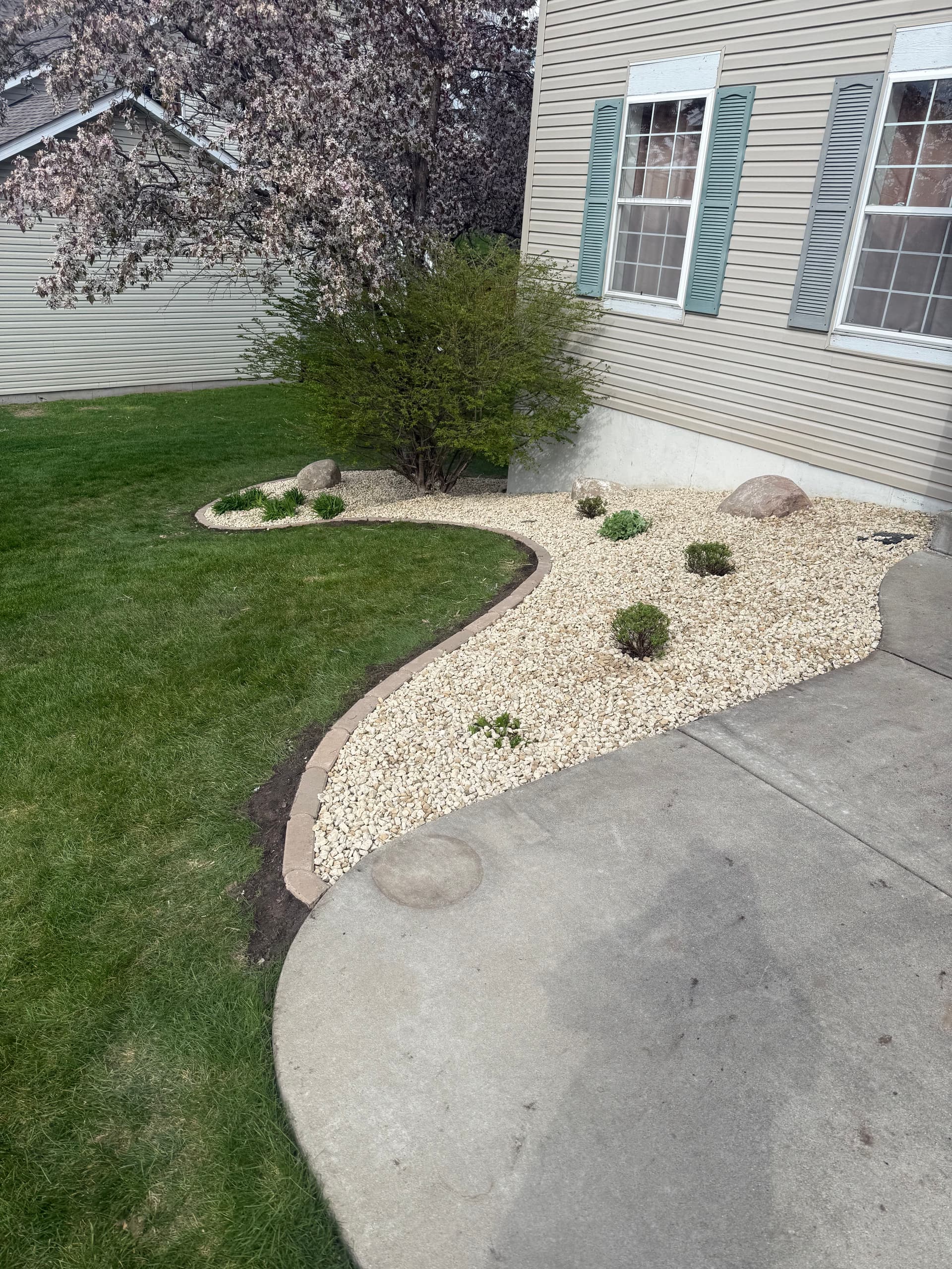 Gallery photos for Old Mulch Out, Rock and Paver Edging In for This Eagan Yard: Image #1