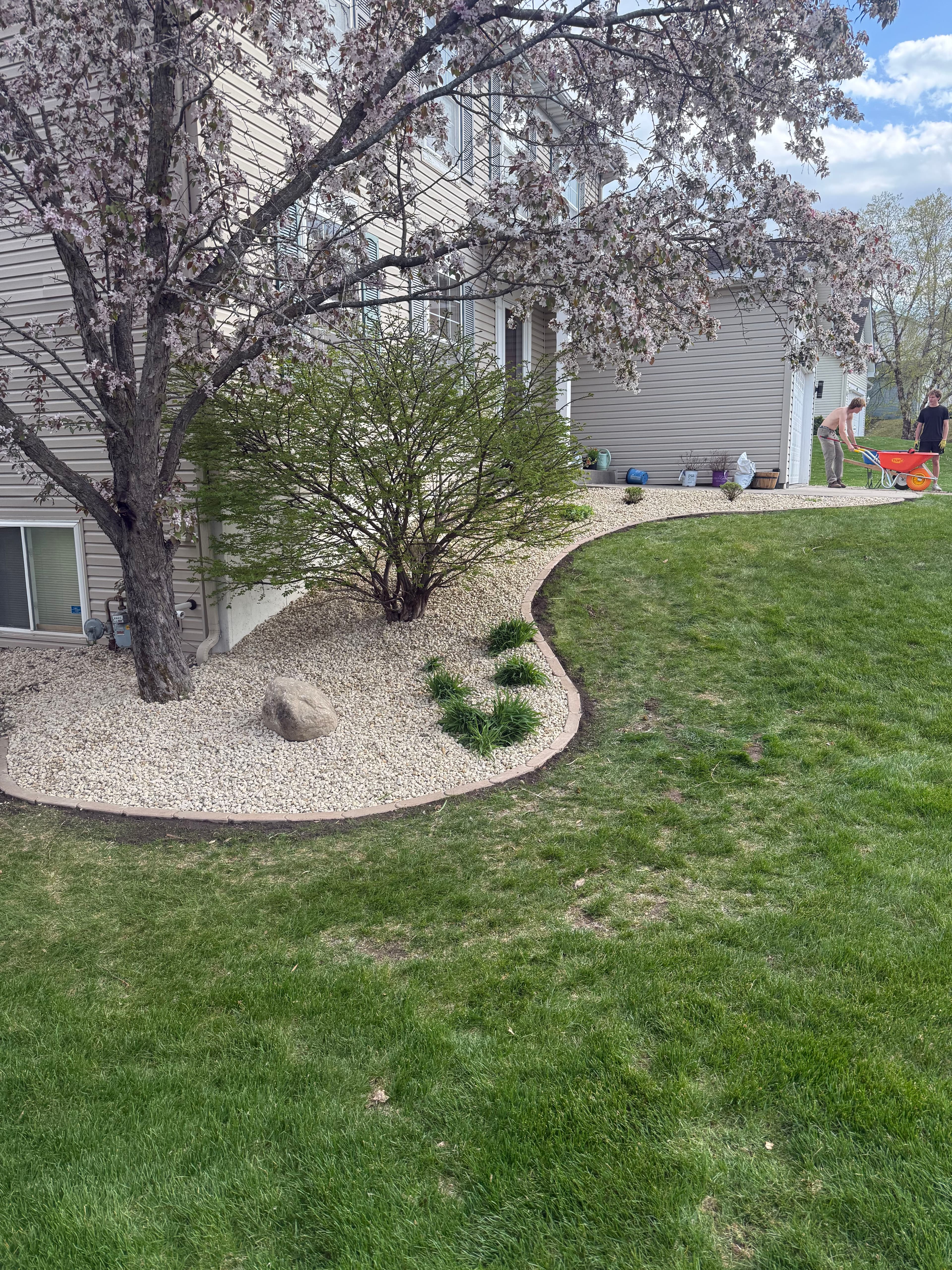 Project Old Mulch Out, Rock and Paver Edging In for This Eagan Yard image
